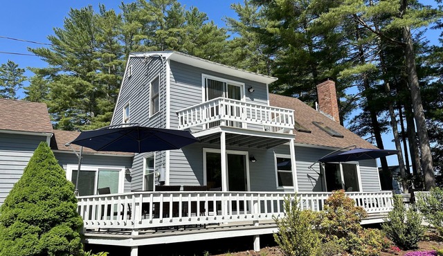 Two updated lakefront homes - dock with boat slip, game room, & screened porch