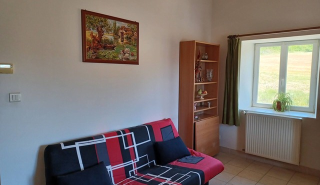 Type F2 apartment in a quiet country setting