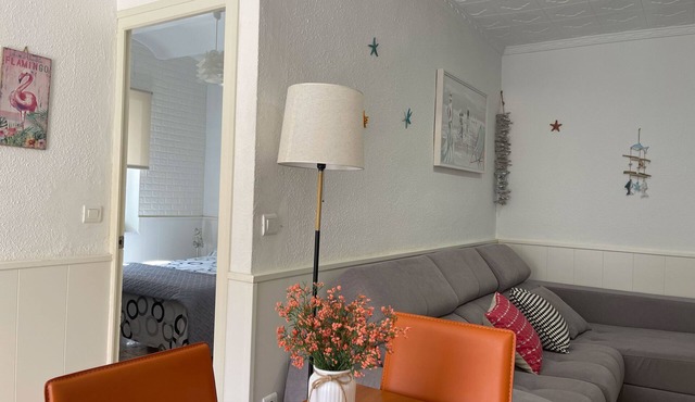 Typical town house on the ground floor, well lit and a large equipped terrace.
