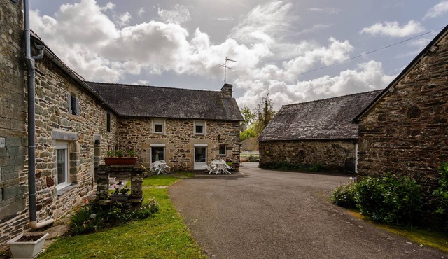 Typical Breton house with large garden near lake guerlédan