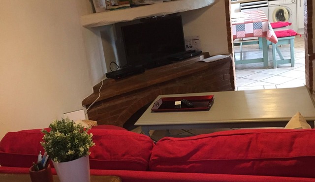 Typical country house, pink brick and Lauragais pebbles.