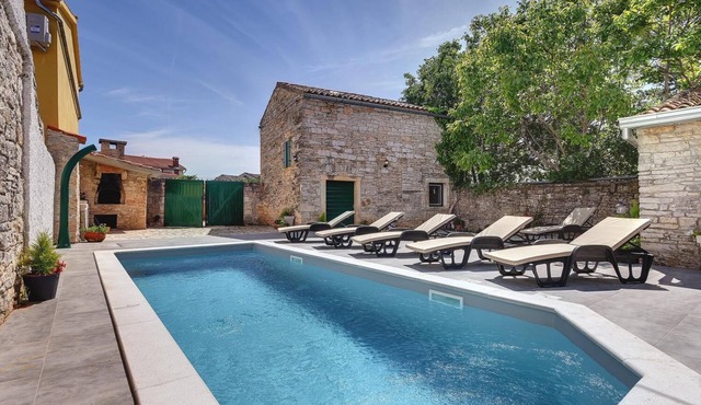 Typical holiday home with private pool, table football, gym