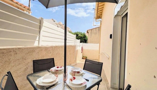 Typical house 20 m from the beach and the port