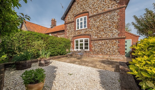 Typical Norfolk brick and flint character cottage which is cosy and comfortable
