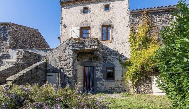 Typical stone house in the middle of a quiet village