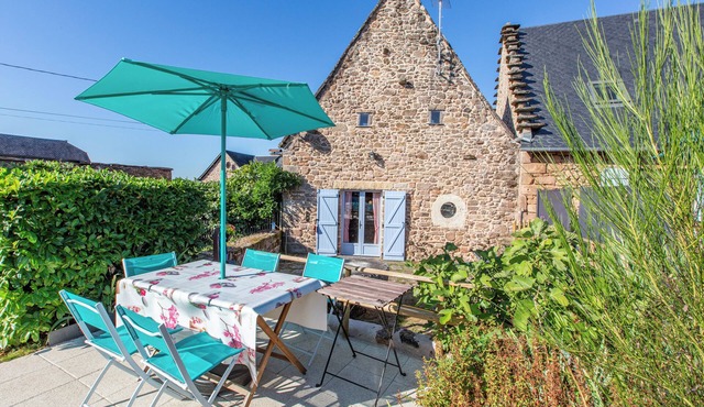Typical thatched cottage of stone within landscapes of Corrèze