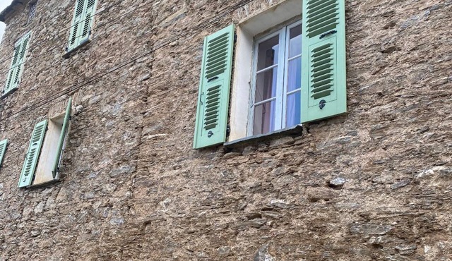 Typical village house with swimming pool and large garden with exceptional view