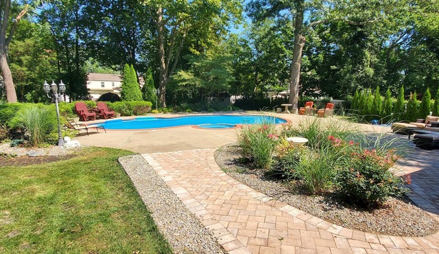 Ultimate Estate on Acre of Land with Pool (across from golf course/near beach)