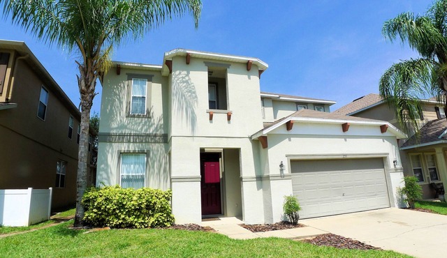 Ultra modern, two-story Legacy Park 4/3 Pool Home with formal dining. Pet Friendly!