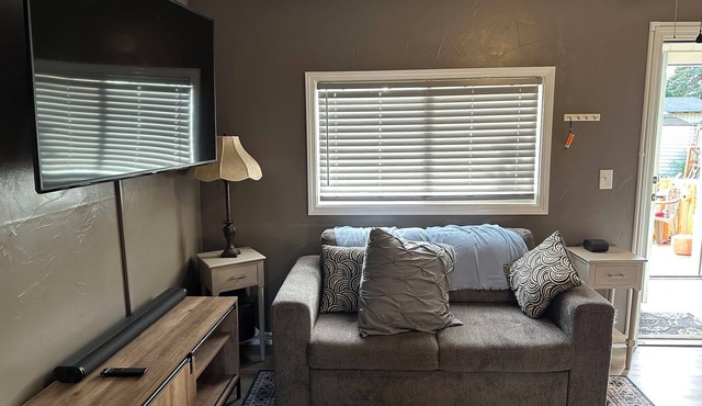 Unique 1 bedroom custom remodeled low energy foot print unit in private complex.