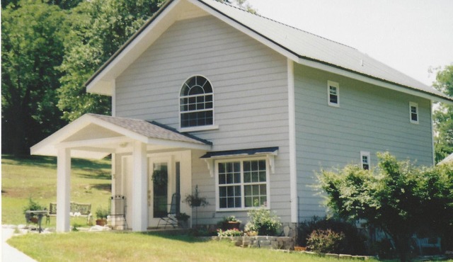 Unique 75 year old converted barn with beautiful loft bedroom.