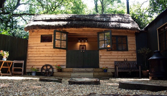 Unique and Bespoke Stunning Thatched Dorset Shepherds Huts with Private Hot Tub