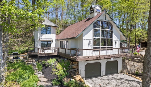 Unique and secluded A frame home on 31 acres with hot tub.