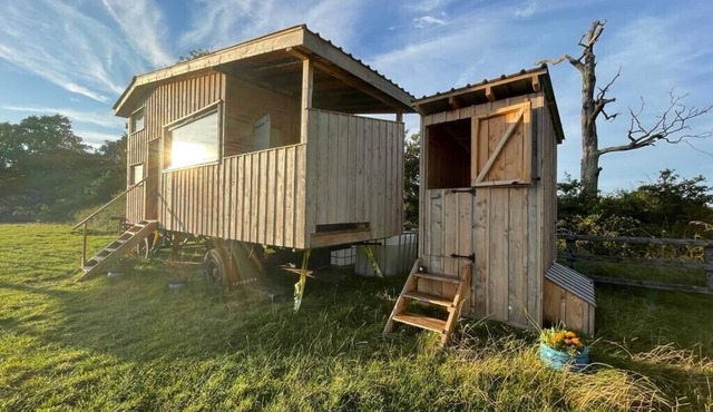 Unique Cabin with breathtaking views, outdoor bath, and private field. Sleeps 4