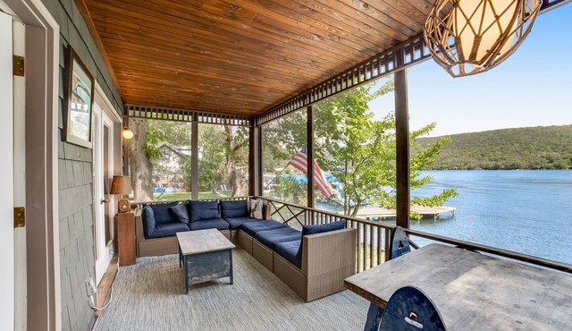 Unique & charming lakefront home with screened-in patio