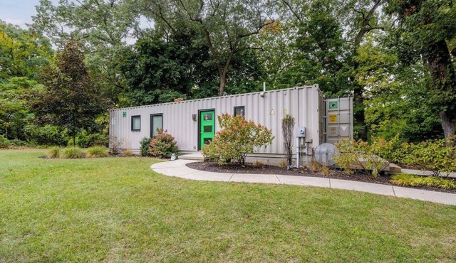 Unique container home retreat near Lake Michigan. Enjoy a peaceful, private setting with a spacious deck, firepit, and ravine views. Close to beaches, wineries, and downtown St. Joseph—perfect for a relaxing Southwest Michigan getaway.