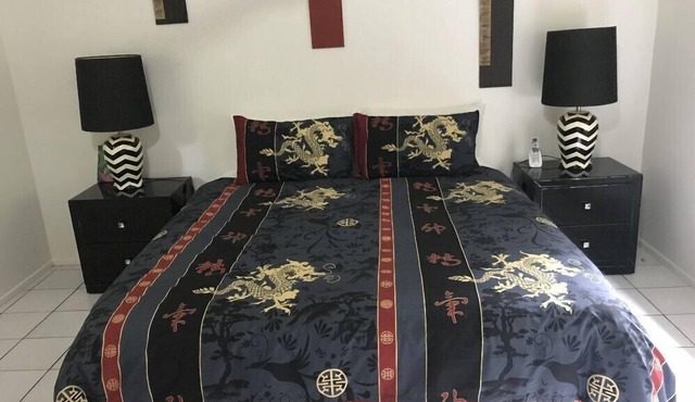 Unique holiday home with private waterfalls and swimming pool right by your deck