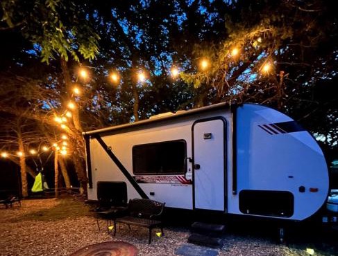 Unique Jungle-Style Glamping RV with 8-Foot Suspended Tree Tent near Creek Trails in Forestburg, Texas