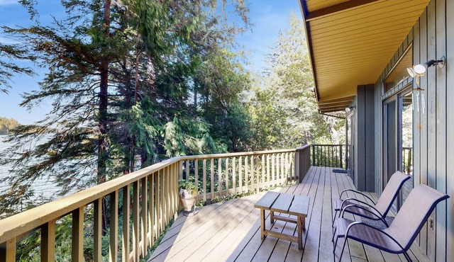 Unique lakefront cabin near the dunes with a private dock & fireplace