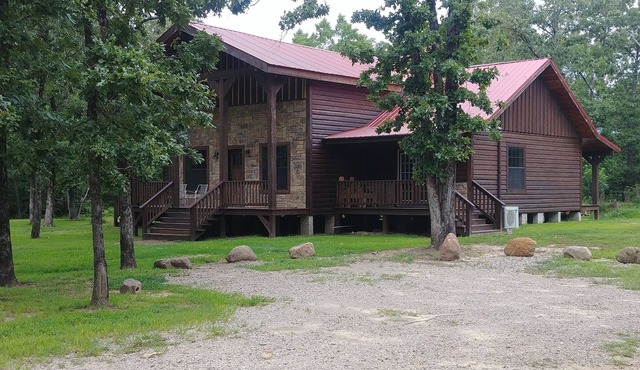 Unique Log House nestled in the woods near Billy Creek.