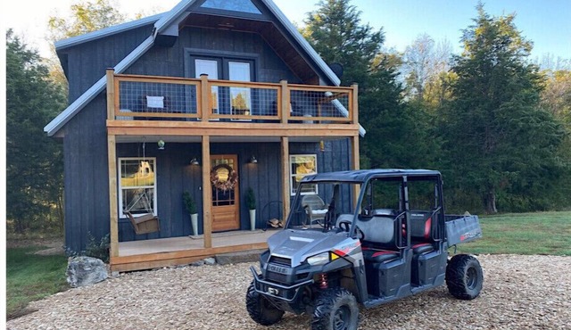 Unique,modern, secluded cabin on 95 river front acres-utv-kayaks-trails-hot tub