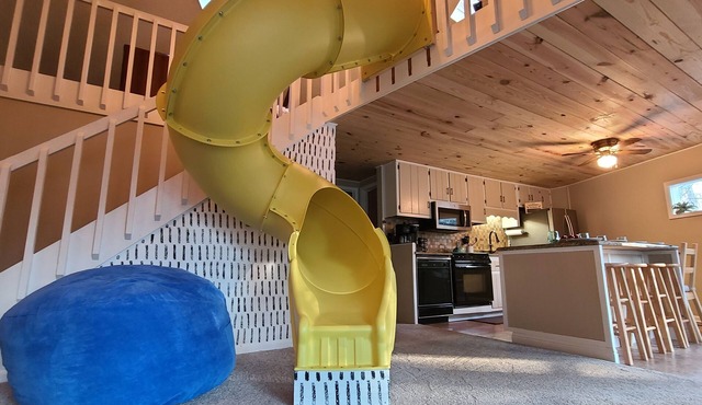 Unique mountain getaway! Hot tub, game room, year round community pool!