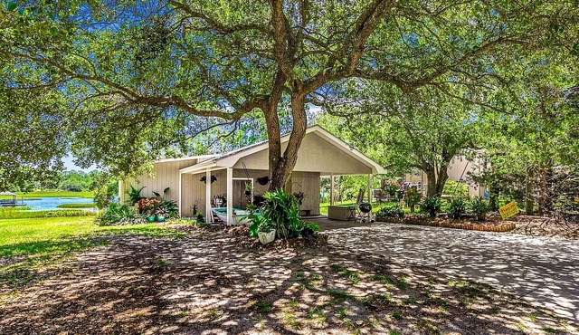 Unique riverfront home with two suites, high-speed WiFi, & private dock