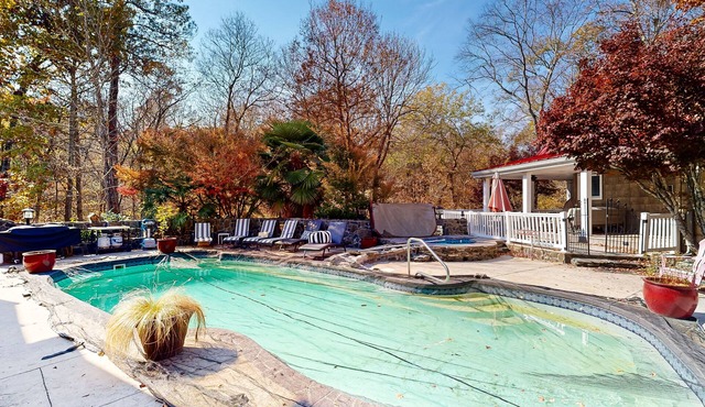 Unique riverfront studio with pool, hot tub, W/D access, grill & AC