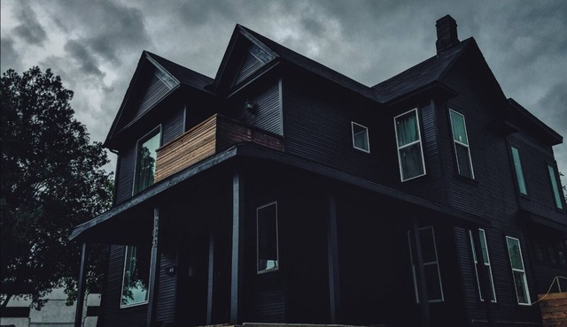 Unique two story house nestled 1 mile away from downtown.