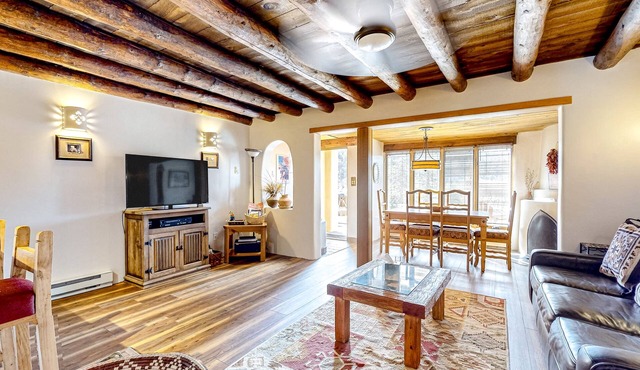 Unique two-story mountain view getaway with a patio, fireplaces, balcony
