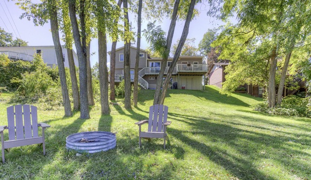 Unique river front home in the village. Walk to downtown.