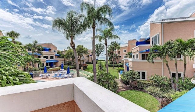 Unit #210 Sand Cay Beach Resort Pool View