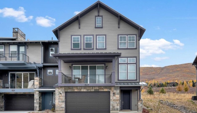 Unparalleled luxury condo nestled with views of both Jordanelle Reservoir & Deer Valley