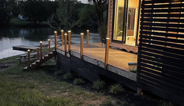Unplug and unwind in this charming loft cabin nestled on the water’s edge.