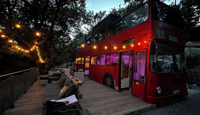 Unusual bus from Eden des Grisons, private Jacuzzi, view of Lac de Serre-Ponçon