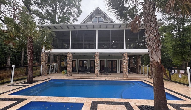 Unwind in Style: Premium Lakefront Oasis w Hot Tub, Dock, and Over-Water Sun Net