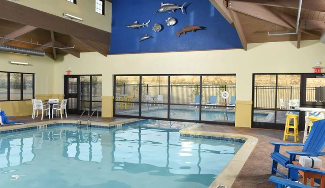 Unwind in Style: Spacious Suites & Relaxing Poolside Retreat | 4 Units
