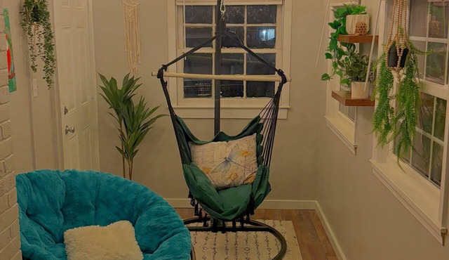 Updated 4-bedroom house with relaxing sunroom; minutes from downtown Raleigh.