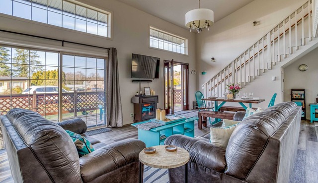 Updated Bay City Home Has Sunny Great Room, Fenced Yard, Deck, and Game Room!