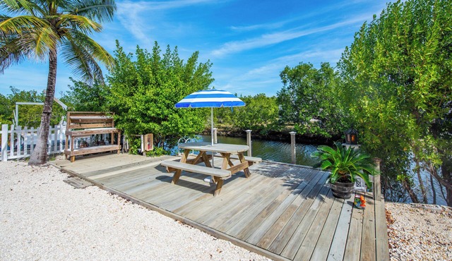 Updated Canal Home with Dock for 25' Boat, Sandbar Access & Backcountry Fishing