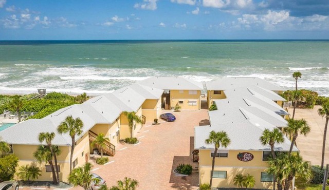 Updated Condo with Beach View 30 steps away from your toes being in the sand!