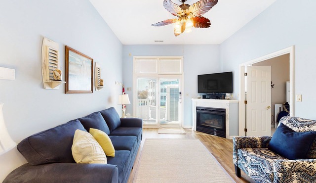 Updated condo with balcony, pool, fireplace & washer/dryer