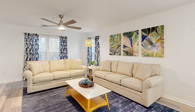 Updated condo with screened porch & shared pool - near golf/beach/shops