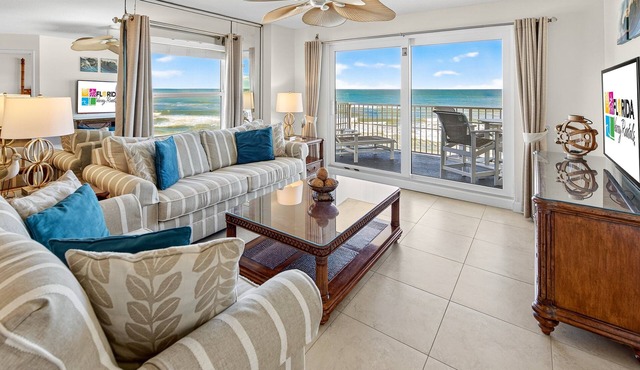 Updated direct oceanfront 2/2, corner condo with private balcony, heated pool and garage
