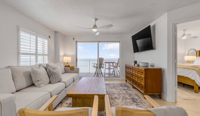 Updated direct oceanfront corner 2/2 with stunning beach views, a heated pool, and parking garage