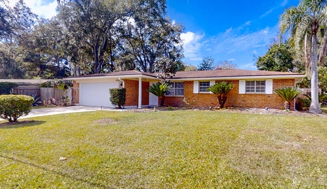 Updated dog-friendly home near water with private pool, patio, streaming, AC