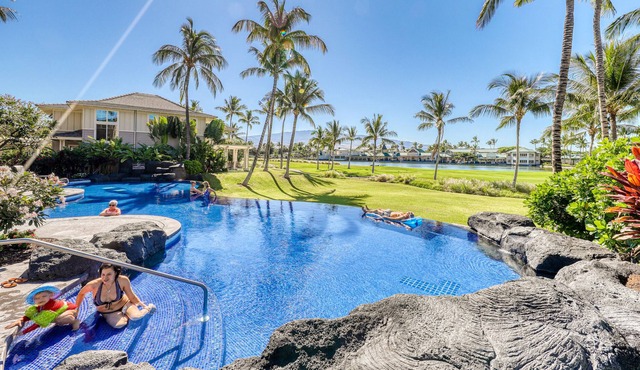 Updated ground-level condo with A/C, pool, & fitness center