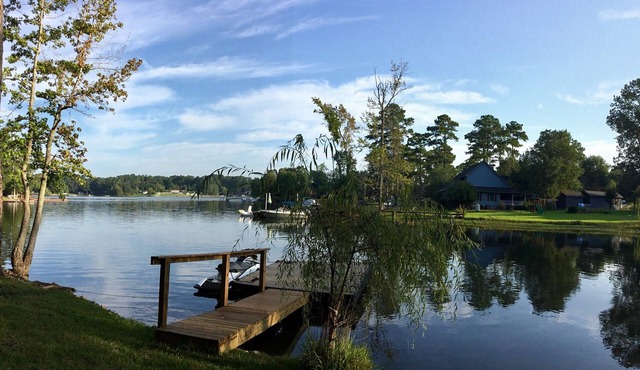 Updated Home across the street from the lake. With Private Dock and Land.