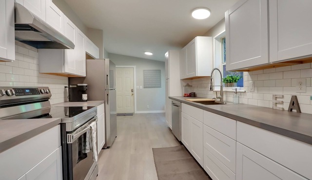 Updated home on 5 acres with hot tub!