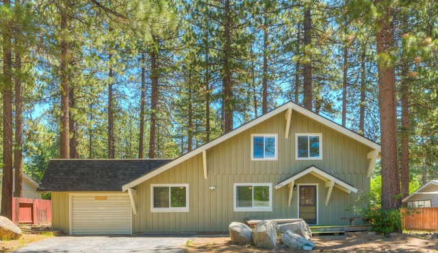 Updated home tucked in trees with WiFi, wood-burning stove, & W/D - dogs OK